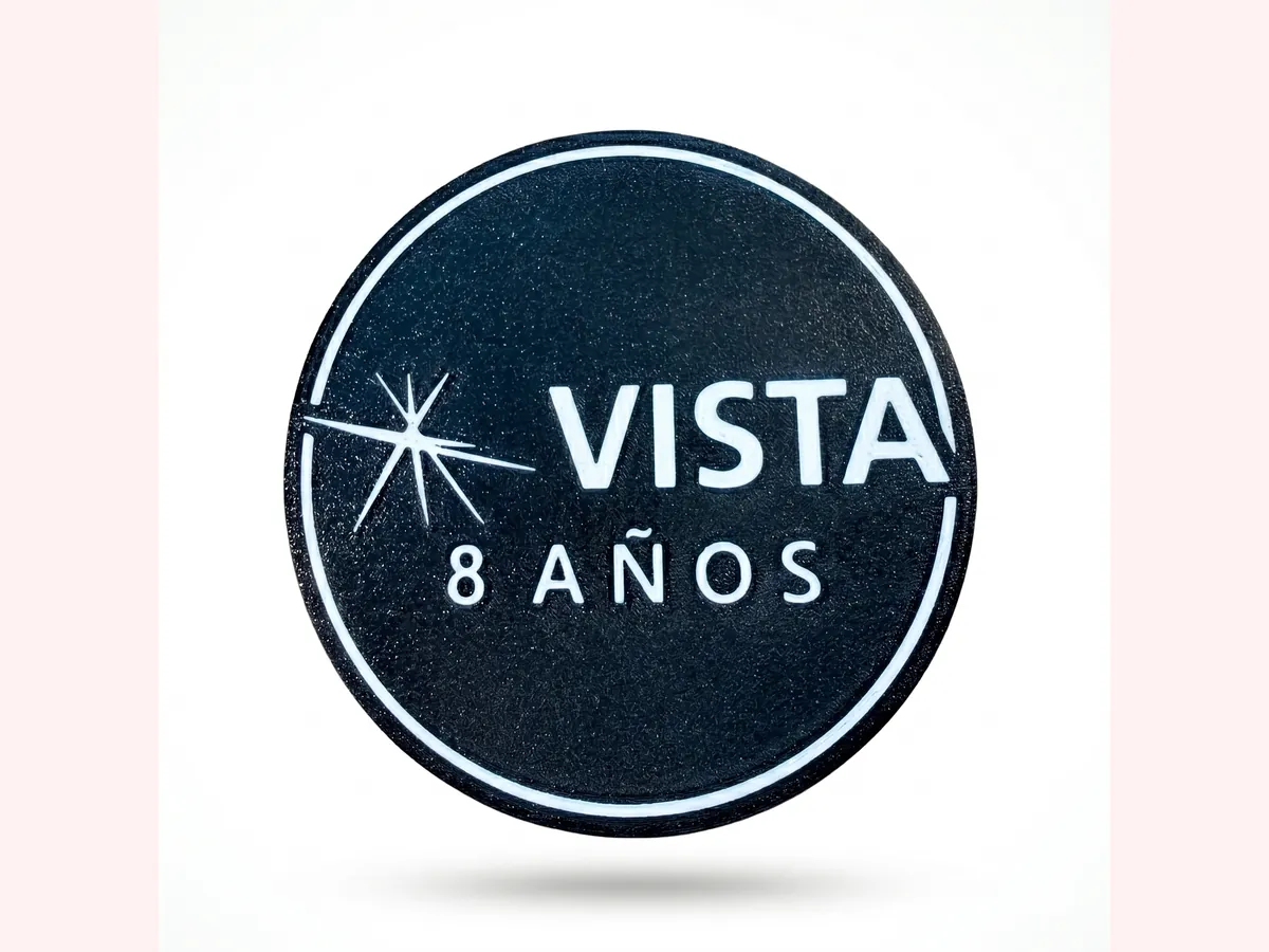 Posavasos azul oscuro con marca Vista en blanco